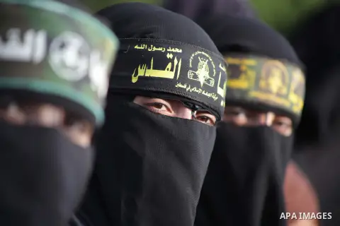 Female supporters of Islamic Jihad movement take part in anti-Israeli march on November 13, 2013 in the streets of Gaza City as part of the celebrations marking the first anniversary of Israel's Operation Pillar of Defen...
