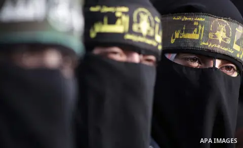 Female supporters of Islamic Jihad movement take part in anti-Israeli march on November 13, 2013 in the streets of Gaza City as part of the celebrations marking the first anniversary of Israel's Operation Pillar of Defen...