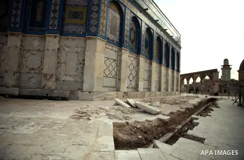 A ditch is seen during a restoration work in front of the Dome of the Rock mosque at the al-Aqsa compound, in Jerusalem's old city on November 13, 2013. Restoration works started at al-Aqsa compound for the water pipelin...