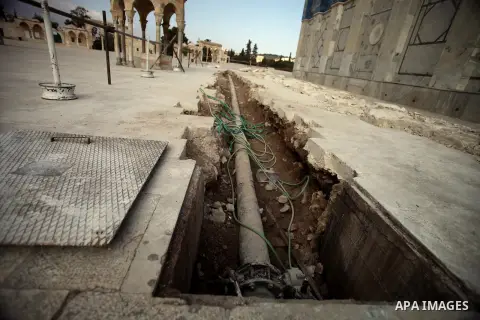 A ditch is seen during a restoration work in front of the Dome of the Rock mosque at the al-Aqsa compound, in Jerusalem's old city on November 13, 2013. Restoration works started at al-Aqsa compound for the water pipelin...