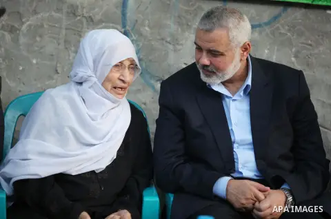 Palestinian Prime Minister in Gaza, Ismael Haniyah, visit the home of Hamas militants commander Ahmed Jaabari in Gaza City on November15, 2013, ahead of the first anniversary an Israeli army operation which was launched...