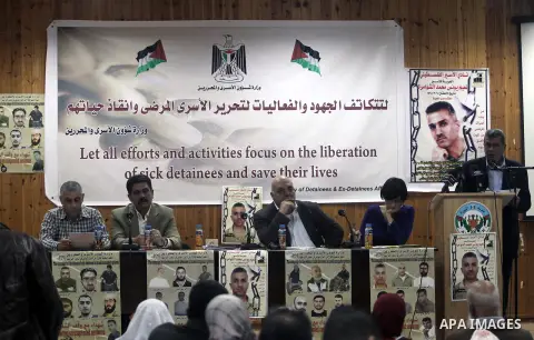 Palestinian relatives of prisoners in Israeli jails attend a press conference discusses the situation of sick prisoners calling for their release and save their lives, in the West Bank City of Ramallah, November 21, 2013...