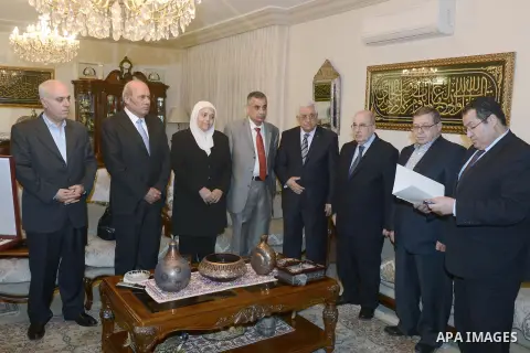 The son of Palestinian leader Abdel Fattah Hamoud receives the badge of honor by President Mahmoud Abbas, in Amman, Jordan on November 21, 2013. Photo by Thaer Ganaim