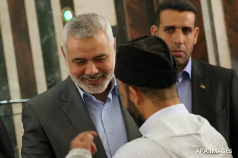 Palestinian Prime Minister in Gaza Strip, Ismail Haniyeh meets with the convoy of "Miles of Smiles 23" following the Friday prayers, in Gaza City on November 22, 2013. Photo by Mohammed Asad