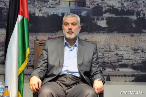 Palestinian Prime Minister in Gaza Strip, Ismail Haniyeh meets with the convoy of "Miles of Smiles 23" at his house in Gaza city November 22, 2013. Photo by Mohammed Talatene