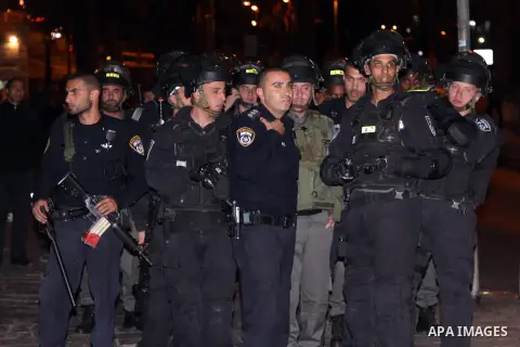 Israeli border policemen arrest a Palestinian protester during a demonstration in Jerusalem, on 27 November 2013. The demonstrations began after the killing of three Palestinians militants in the West bank village of Yat...
