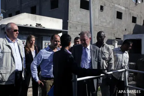 The United Nations Special envoy for the Middle East Robert H. Serry, inspects sanitation after a sewerage pipe in the Zeitoun neighborhood flooded, after the pumps stopped due to lack of fuel and electricity, in Gaza Ci...