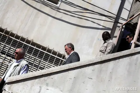 The United Nations Special envoy for the Middle East Robert H. Serry, inspects sanitation after a sewerage pipe in the Zeitoun neighborhood flooded, after the pumps stopped due to lack of fuel and electricity, in Gaza Ci...