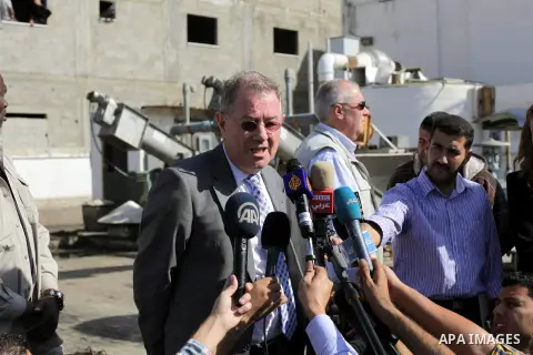 The United Nations Special envoy for the Middle East Robert H. Serry, speaks to media after inspects sanitation following a sewerage pipe in the Zeitoun neighborhood flooded, after the pumps stopped due to lack of fuel a...