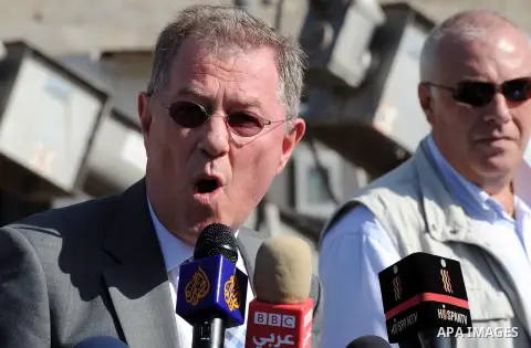 The United Nations Special envoy for the Middle East Robert H. Serry, speaks to media after inspects sanitation following a sewerage pipe in the Zeitoun neighborhood flooded, after the pumps stopped due to lack of fuel a...