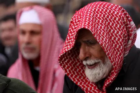 Palestinians pray for rain at al-Kateba square in Gaza City on December 2, 2013. The Ministry of Awqaf and Religious Affairs have held special prayers to invoke God for rain. The special Muslim prayers known as Salat al-...