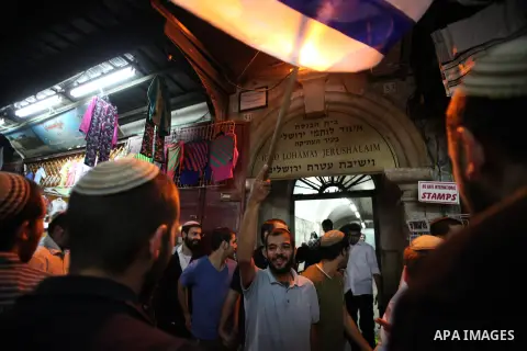 Ultra-Orthodox Jews light the fifth Hanukkah candle during the Jewish holiday of Hanukkah in Jerusalem's Mea Shearim neighbourhood, on Dec. 3, 2013. Hanukkah, also known as the Festival of Lights, is one of the most impo...