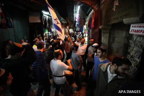 Ultra-Orthodox Jews light the fifth Hanukkah candle during the Jewish holiday of Hanukkah in Jerusalem's Mea Shearim neighbourhood, on Dec. 3, 2013. Hanukkah, also known as the Festival of Lights, is one of the most impo...