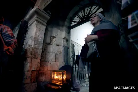 Ultra-Orthodox Jews light the fifth Hanukkah candle during the Jewish holiday of Hanukkah in Jerusalem's Mea Shearim neighbourhood, on Dec. 3, 2013. Hanukkah, also known as the Festival of Lights, is one of the most impo...