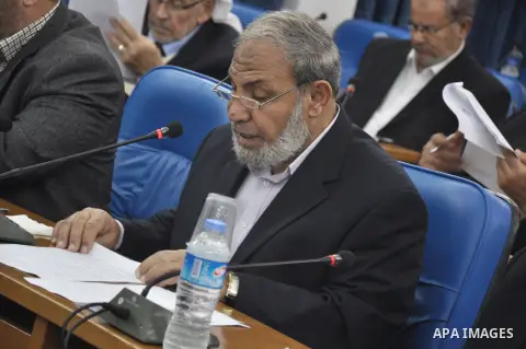 Palestinian Hamas leader Mahmoud al-Zahar, attends the meeting with members of the Palestinian Legislative Council, at the Legislative Council, in Gaza City on Dec. 04, 2013. Photo by Mohammed Talatene