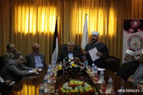 Palestinian Prime Minister in Gaza, Ismail Haniyeh, speaks at a meeting during his visit to the Court of eliminating the legitimate, in Gaza City on Dec. 04, 2013. Photo by Ashraf Amra