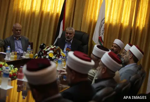 Palestinian Prime Minister in Gaza, Ismail Haniyeh, speaks at a meeting during his visit to the Court of eliminating the legitimate, in Gaza City on Dec. 04, 2013. Photo by Ashraf Amra