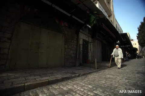 Closed shops are seen during a protest against the storming of Al-Aqsa Mosque, in Jerusalem's Old City December 4, 2013. Hanukkah, also known as the Festival of Lights, is one of the most important Jewish holidays and ce...