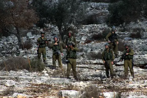 Israeli security forces fire tear gas towards Palestinian protesters as clashes broke out during a demonstration against the expropriation of Palestinian land by Israel in the village of Kfar Qaddum, near the occupied We...