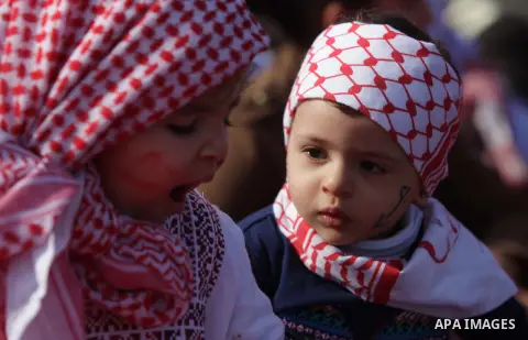 Palestinians take part in a rally in Gaza City on December 7, 2013, marking the 46th anniversary of the founding of the Popular Front for the Liberation of Palestine (PFLP), a Palestinian Marxist revolutionary organizati...