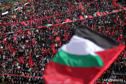 Palestinians take part in a rally in Gaza City on December 7, 2013, marking the 46th anniversary of the founding of the Popular Front for the Liberation of Palestine (PFLP), a Palestinian Marxist revolutionary organizati...