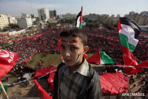 Palestinians take part in a rally in Gaza City on December 7, 2013, marking the 46th anniversary of the founding of the Popular Front for the Liberation of Palestine (PFLP), a Palestinian Marxist revolutionary organizati...