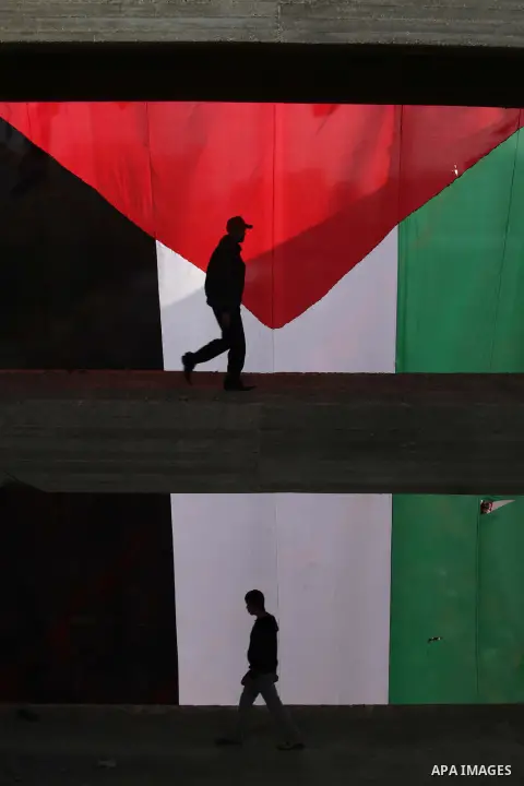 Palestinians take part in a rally in Gaza City on December 7, 2013, marking the 46th anniversary of the founding of the Popular Front for the Liberation of Palestine (PFLP), a Palestinian Marxist revolutionary organizati...