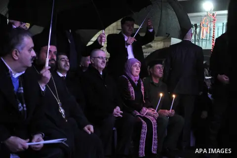Palestinian Prime Minister Rami Hamdallah, attends the celebration of lighting the Christmas tree, in the West Bank City of Ramallah, December 10, 2013. Photo by Issam Rimawi