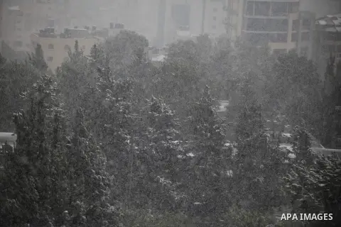 A general view of the snow during snowy weather in the West Bank city of Ramallah, 12 December 2013. The West Bank was affected by a snowstorm over the weekend, hitting Nablus, Ramallah and Jerusalem. Palestinian Authori...