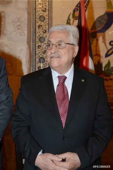 Palestinian President, Mahmoud Abbas (Abu Mazen), attends a reception hosted by the presidency in the West Bank city of Bethlehem, on Dec. 24, 2013. Photo by Thaer Ganaim