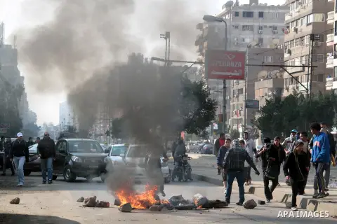 Egyptian supporters of the Muslim Brotherhood gather during a protest in Cairo, Egypt, 10 January 2014. Egyptian authorities outlawed the Brotherhood in September, and declared it a terrorist group in December. The group...