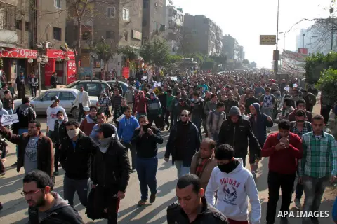 Egyptian supporters of the Muslim Brotherhood gather during a protest in Cairo, Egypt, 10 January 2014. Egyptian authorities outlawed the Brotherhood in September, and declared it a terrorist group in December. The group...