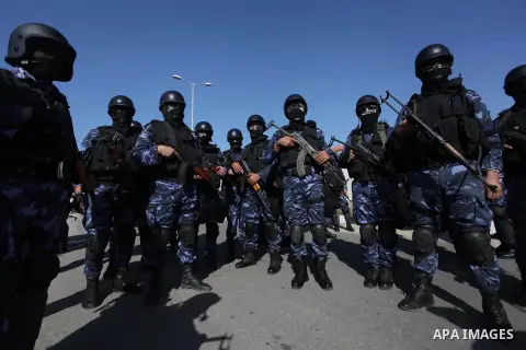 Palestinian police forces stand ready during preparations to mark the anniversary of former Palestinian interior minister Said Siam's, in Gaza City on January 11, 2013. Photo by Ashraf Amra