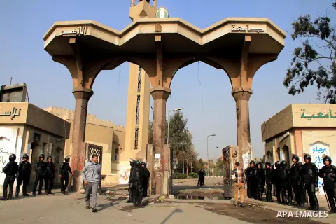 Egyptian security forces check students of al-Azhar University outside their residential area, in Cairo, January 12, 2013. Reports state that three years after the Arab Spring, pro-military groups and old regime stalwart...