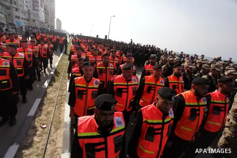 Palestinian civil defense show their skills during a military parade in Gaza city on January 13, 2014, marking the fifth anniversary of the three-week Israeli offensive on the Gaza Strip in which more than a thousand Pal...