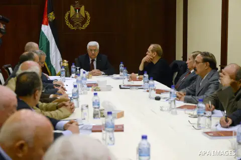 Palestinian President Mahmoud Abbas meets with members of the Executive Committee of the Palestine Liberation Organization (PLO), in the West Bank City of Ramallah on January 13, 2014. Photo by Thaer Ganaim