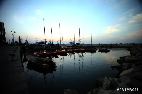 A picture taken on January 15, 2014 shows the boats at the Jaffa seaport. Photo by Saeed Qaq