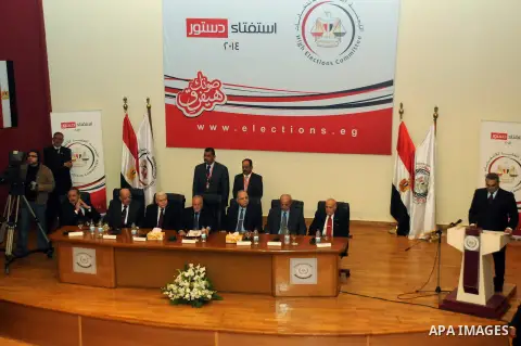 Nabil Salib, head of the Supreme Election Committee, holds a news conference announcing a new constitution in Cairo January 18, 2014. More than 98 percent of voters backed the new Egyptian constitution in a referendum th...