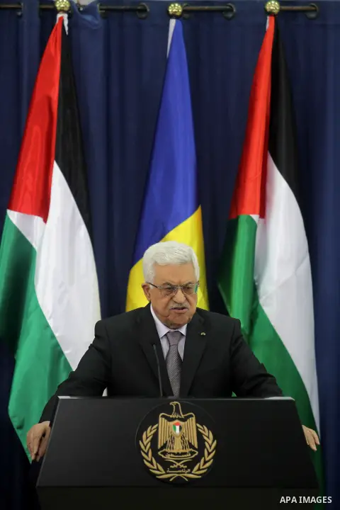President of Romania Traian Basescu and Palestinian President Mahmoud Abbas, hold a joint press conference at Abbas headquarter in the West bank town of Ramallah, 21 January 2014. Basescu is in Ramallah for a meeting wit...