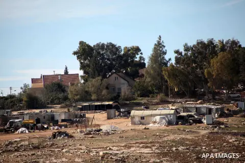 A general view shows the tents of Palestinian Bedouins at Khirbet Umm Al-Khair south the West Bank City of Hebron January 21, 2014. Israeli forces raided Umm al-Khair region several times and notified residents of its de...