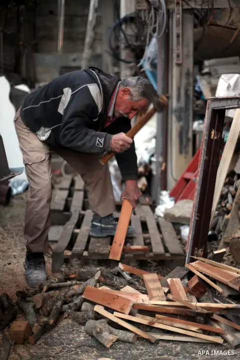 A Palestinian carpenter works at his workshop in the village of Tarshiha, north Acre on January 21, 2014. Tarshiha was in the territory allotted to the Arab state under the 1947 UN Partition Plan. However, in the 1948 Ar...
