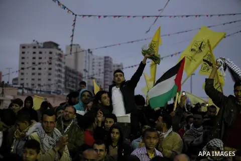Palestinians attend a mass wedding ceremony in Gaza City on February 04, 2014. Nearly 50 Palestinians were married in the Gaza Strip in a mass wedding funded by the office of Palestinian President Mahmoud Abbas. Photo by...