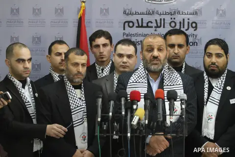 Palestinian Minister of Youth in Gaza Strip Mohammed al-Madhoun speaks during a press conference, in Gaza city, on Feb. 16, 2014. Photo by Mohammed Asad