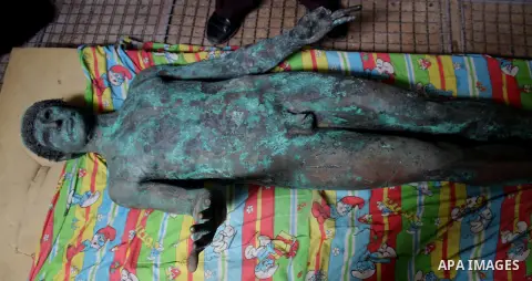 A picture taken on September 19, 2013 shows a 2,500-year-old bronze statue of the Greek god Apollo discovered by Palestinian fishermen last August. Lost for centuries, the rare bronze statue of the Greek God Apollo has m...