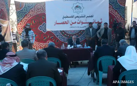 Ahmad Bahar, deputy parliament speaker and Hamas member, speaks during a special session, attended by Hamas MPs, in a tent at Rafah on February 23, 2014, to demand that Egypt lift border crossing restrictions. Egypt impo...