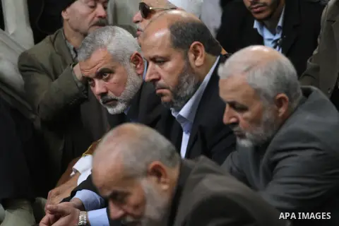 Palestinian Prime Minister in Gaza Strip Ismail Haniyeh, attends the funeral of the Mufti of Gaza Strip Sheikh Abd al-Karim al-Kahlout, in Gaza City on February 25, 2014. Al-Kahlout was one of Gaza's most renowned and re...