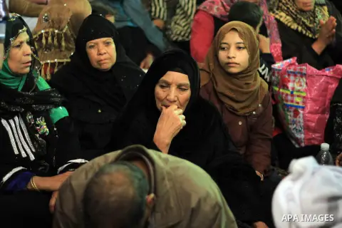 Worshippers attend the El Ishaa prayers at the Al-Hussein mosque, during celebration day of "Moulid Al-Hussein" the birthday of Prophet Mohammad's grandson Hussein in Cairo, February 25, 2014. Photo by Mohammed Bendari