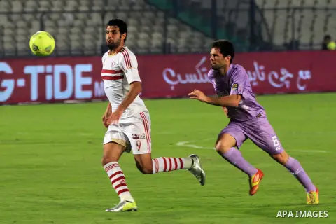 Egyptian players of al-zamalek club compete with kabuscorp sport club during their African Cup soccer match at the sports flowers club's headquarters in Cairo, capital of Egypt, on March 1, 2014. Photo by Mohammed Bendar...
