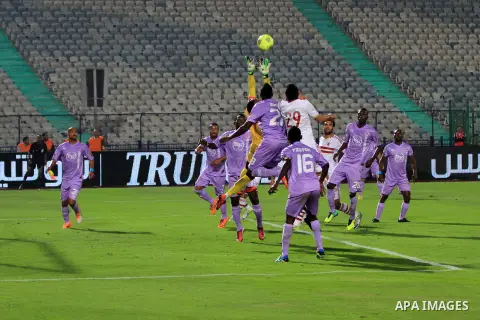 Egyptian players of al-zamalek club compete with kabuscorp sport club during their African Cup soccer match at the sports flowers club's headquarters in Cairo, capital of Egypt, on March 1, 2014. Photo by Mohammed Bendar...