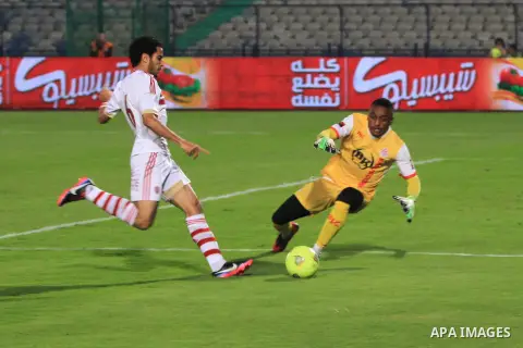 Egyptian players of al-zamalek club compete with kabuscorp sport club during their African Cup soccer match at the sports flowers club's headquarters in Cairo, capital of Egypt, on March 1, 2014. Photo by Mohammed Bendar...